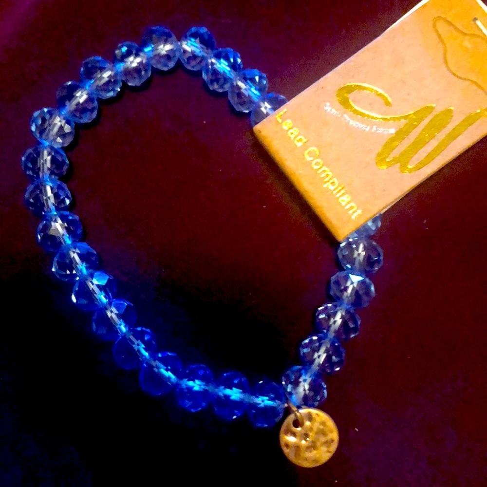 Transparent blue beads, very pretty, stretchy bracelet.